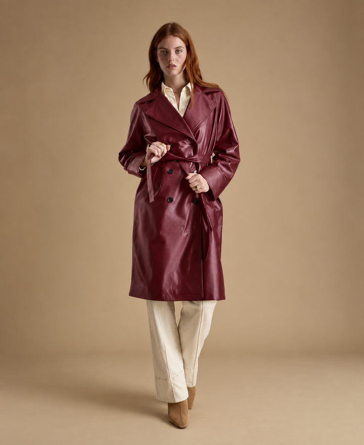 Sloane women's light burgundy leather trench coat styled with belted waist